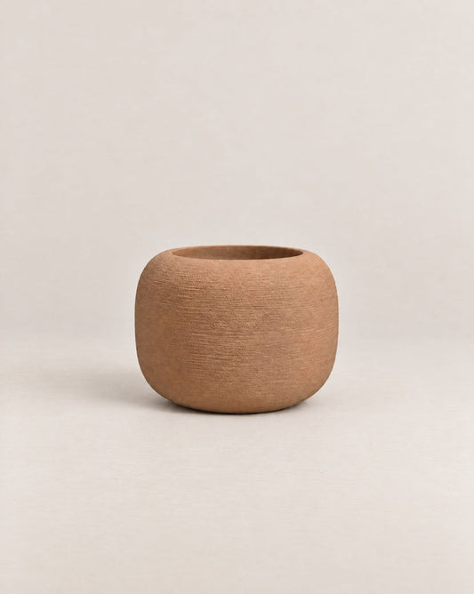 Durum Low desert stone outdoor planter with a compact, rounded shape