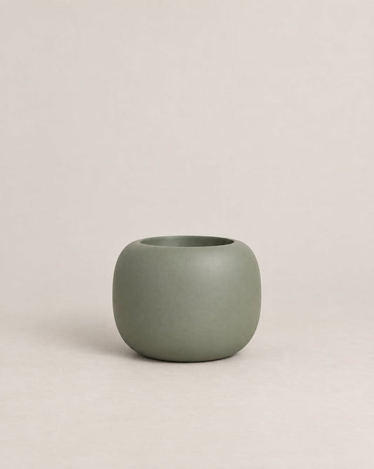 Durum Low green outdoor planter with a compact, rounded shape