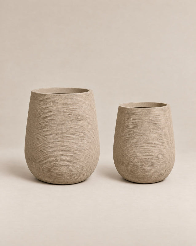 Gemma ribbed putty-finish outdoor planter with a tall, tapered egg shape