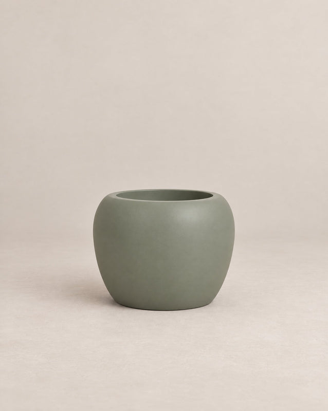 Korby Low green outdoor planter with a low, rounded barrel shape – alternate view