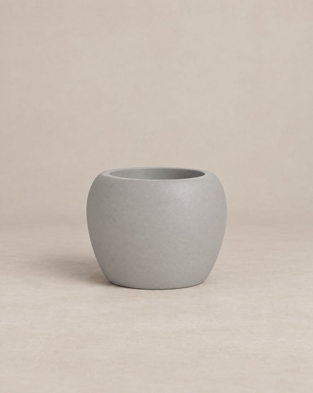 Korby Low white outdoor planter with a low, rounded barrel shape – alternate view