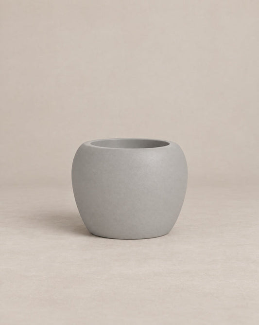 Korby Low white outdoor planter with a low, rounded barrel shape – alternate view