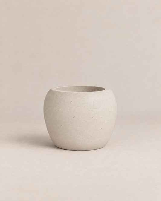 Korby Low grey outdoor planter with a low, rounded barrel shape – alternate view