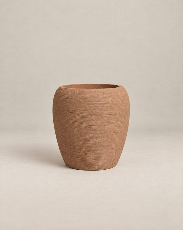 Korby Tall textured desert-finish outdoor planter with a tall, tapered barrel shape – alternate view