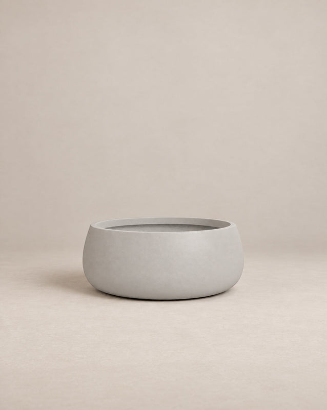 Nenufah white outdoor planter with a wide, shallow bowl shape and angled sides