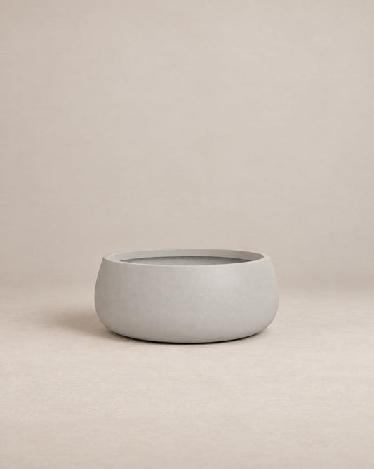 Nenufah white outdoor planter with a wide, shallow bowl shape and angled sides