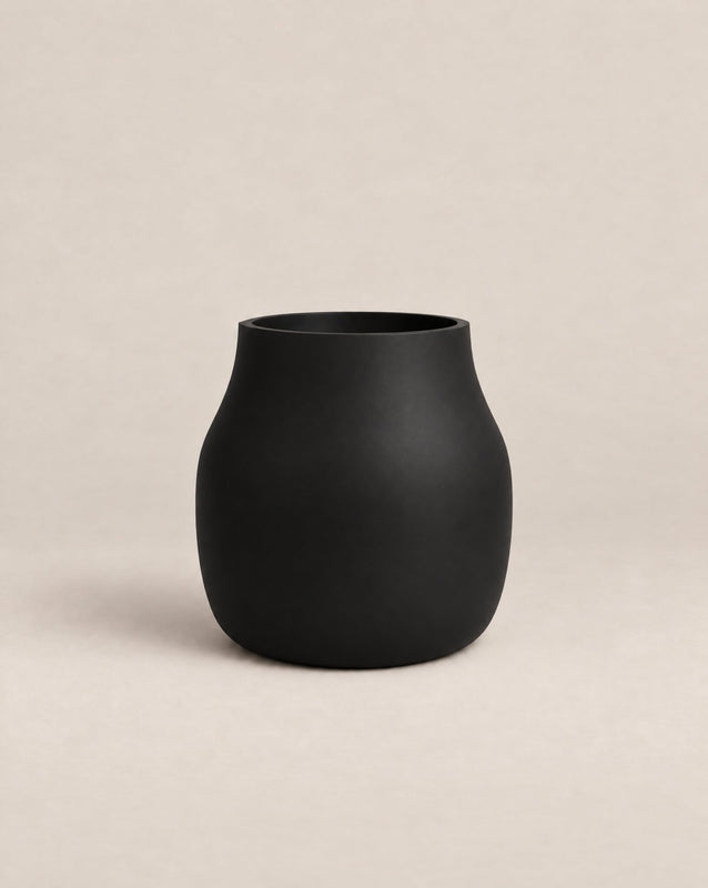 Padina black outdoor planter with a curved, cinched-waist shape and rounded base – alternate view