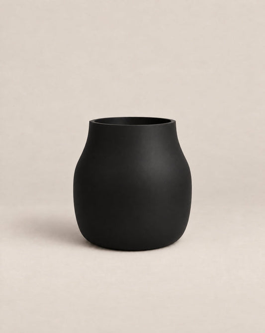 Padina black outdoor planter with a curved, cinched-waist shape and rounded base – alternate view