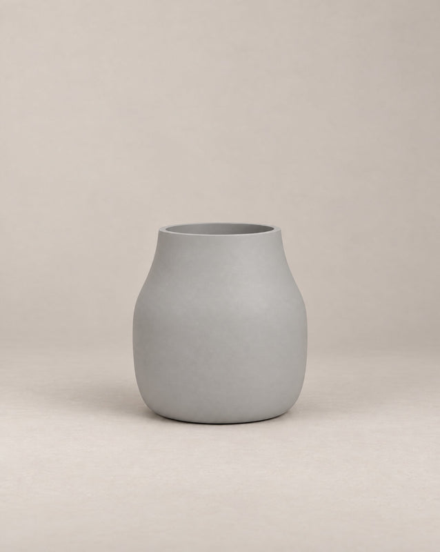 Padina white outdoor planter with a curved, cinched-waist shape and rounded base – alternate view