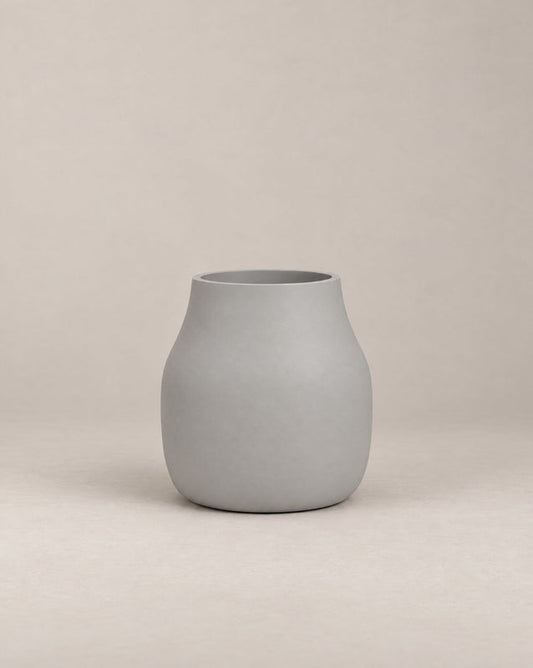 Padina white outdoor planter with a curved, cinched-waist shape and rounded base – alternate view