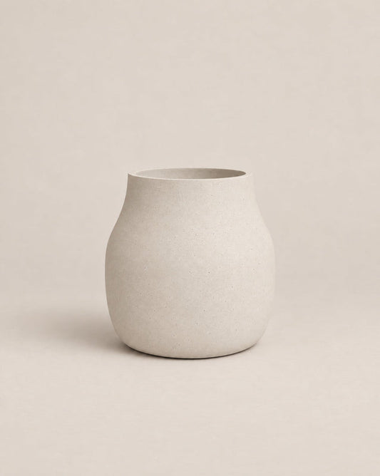 Padina grey outdoor planter with a curved, cinched-waist shape and rounded base – alternate view