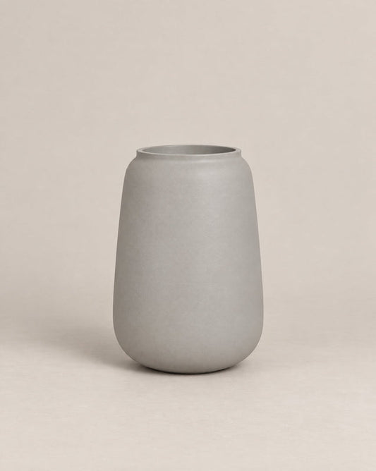 Vaso textured white-finish outdoor planter with a tall, tapered shape
