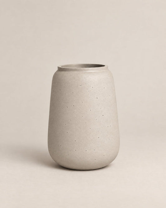 Vaso textured grey-finish outdoor planter with a tall, tapered shape